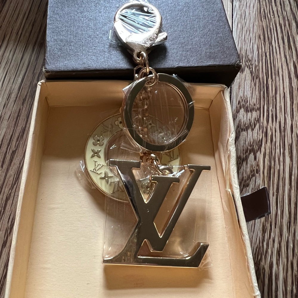 LV Ivory bag charm